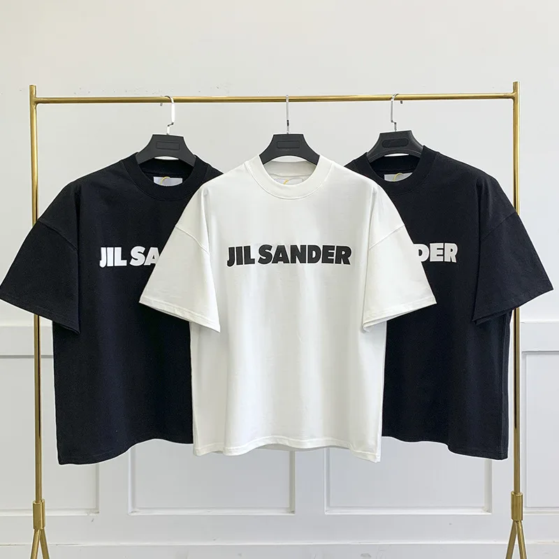 Quality JIL Sander T-Shirt Summer Letter Print Oversized Loose Casual Men's and Women's Couple Tops Brand Short Sleeve Tees
Quality JIL Sander T-Shirt Summer Letter Print Oversized Loose Casual Men's and Women's Couple Tops Brand Short Sleeve Tees