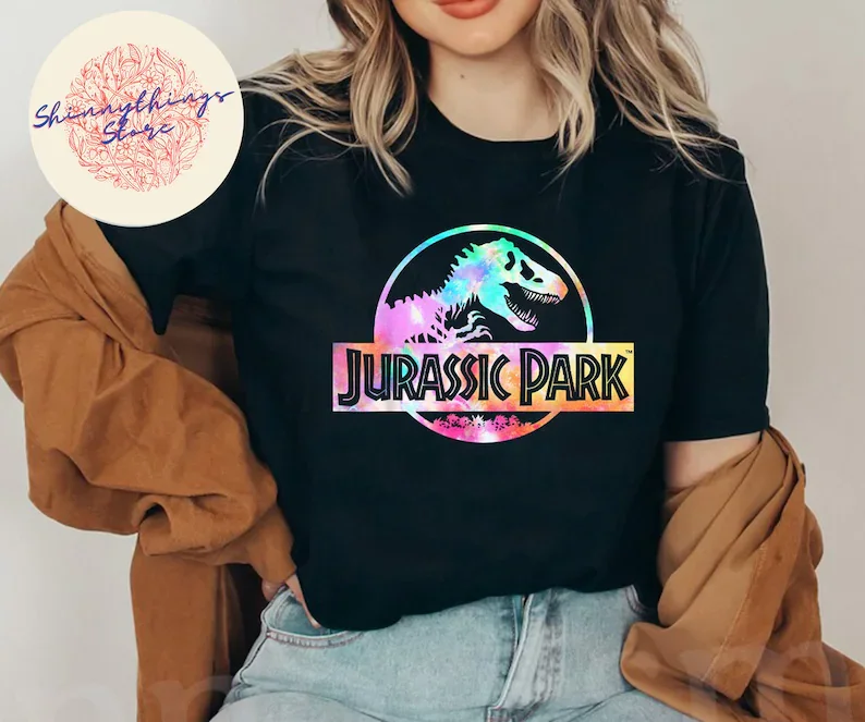 

Jurassic Park Logo Tie Dye Gloss Graphic T-Shirt Jurassic 29th Anniversary Dinosaur Park Movie Bleached Shirt Retro Castle 2022