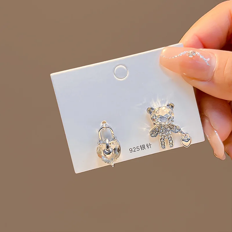 New Silver Needle Romantic Love Bear Earrings High Cold Wind Set Crystal Zircon Shining Earrings Unique Earrings
New Silver Needle Romantic Love Bear Earrings High Cold Wind Set Crystal Zircon Shining Earrings Unique Earrings
