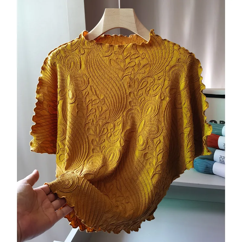High-end Embossed Ruffled Wooden Ear Edge Bat Sleeve Tops Female Casual Loose Hundred with Thin Miyake T-shirt Women Clothing
High-end Embossed Ruffled Wooden Ear Edge Bat Sleeve Tops Female Casual Loose Hundred with Thin Miyake T-shirt Women Clothing