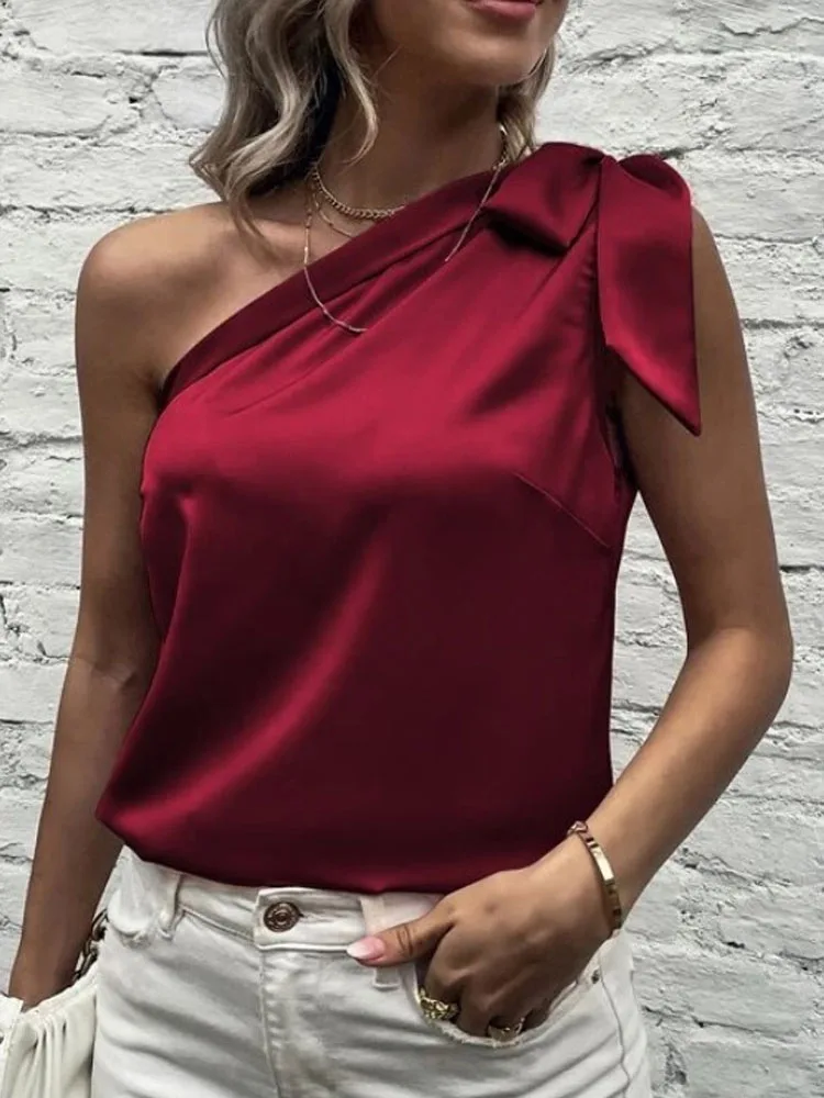 Women Bowknot One-shoulder Blouse Elegant Solid Skew Collar Shirts Pullover Summer Sleeveless Ladies Commute Office Tops Blouses
Women Bowknot One-shoulder Blouse Elegant Solid Skew Collar Shirts Pullover Summer Sleeveless Ladies Commute Office Tops Blouses