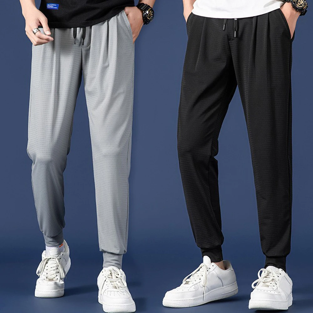Sports Pants Men's Quick-drying Ice Silk Breathable Nine-point Summer Thin Running Fitness Loose Mesh Air-conditioning Trousers
Sports Pants Men's Quick-drying Ice Silk Breathable Nine-point Summer Thin Running Fitness Loose Mesh Air-conditioning Trousers