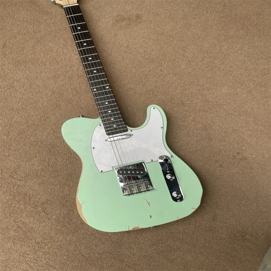 High quality antique make old electric guitar, handmade, light green, silver hardware, free shipping
High quality antique make old electric guitar, handmade, light green, silver hardware, free shipping