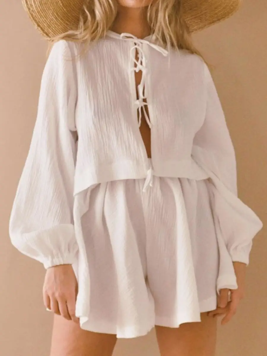 Women Solid Color Set Lantern Sleeve Lace Up O-Neck Blouse or Elastic Waist Loose Shorts
Women Solid Color Set Lantern Sleeve Lace Up O-Neck Blouse or Elastic Waist Loose Shorts
