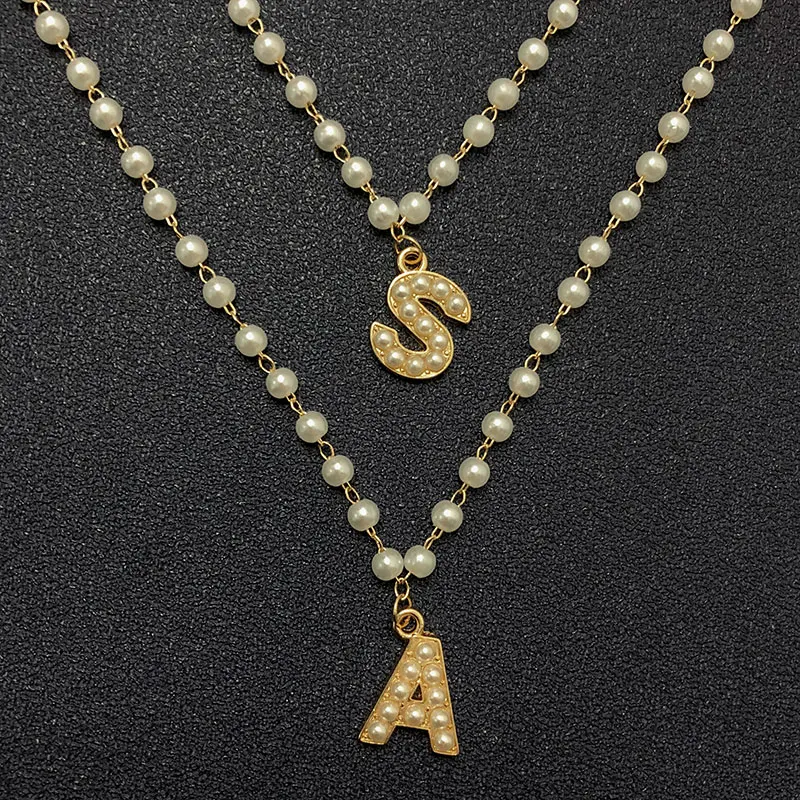 Gold Pearl Chains Initial Letter Necklace for Women Girl 26 A-Z Alphabet Pendant Necklace Collar Fashion Party Jewelry Wholesale 
Gold Pearl Chains Initial Letter Necklace for Women Girl 26 A-Z Alphabet Pendant Necklace Collar Fashion Party Jewelry Wholesale