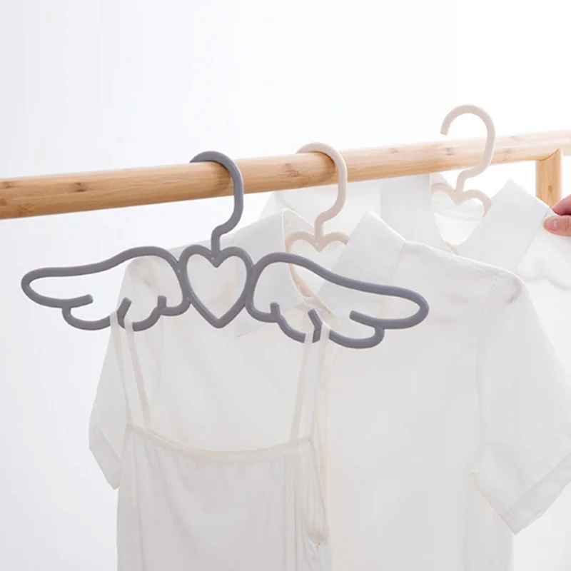 Angel Wings Shape Clothes Hanger Wardrobe Clothing Organizer For Home Hotel Outdoor Baby Coat Drying Rack Scarf Tie Hook 1 PC
Angel Wings Shape Clothes Hanger Wardrobe Clothing Organizer For Home Hotel Outdoor Baby Coat Drying Rack Scarf Tie Hook 1 PC