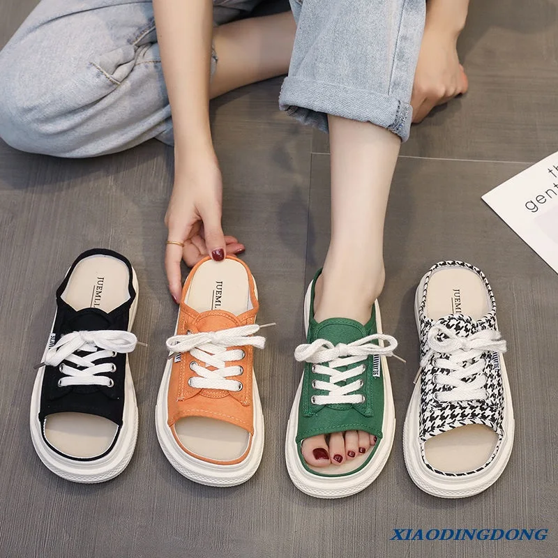 New summer canvas half slippers, wearing Korean style one line slippers, round head sandals, ladies Flat with home sandals
New summer canvas half slippers, wearing Korean style one line slippers, round head sandals, ladies Flat with home sandals
