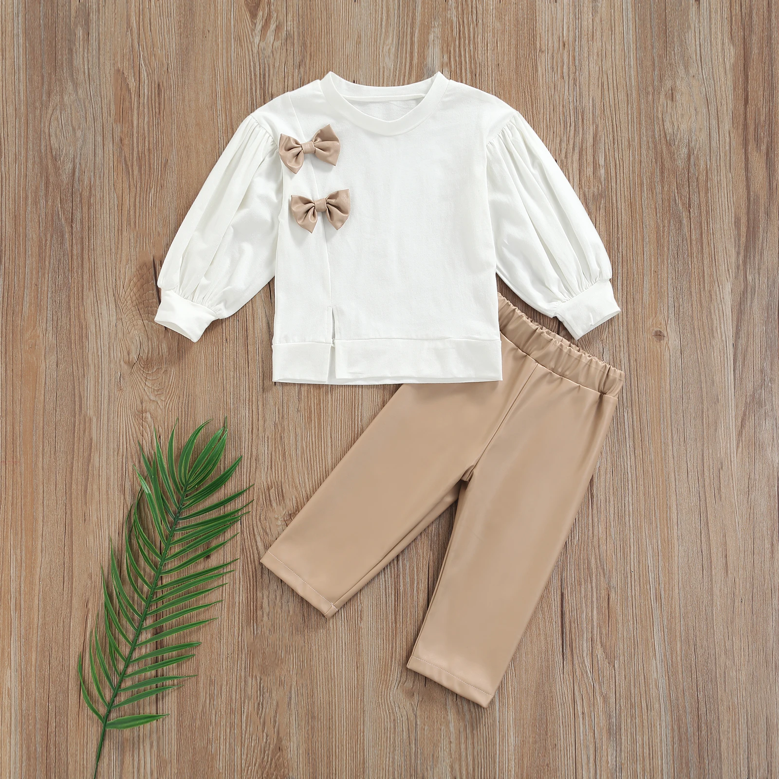 Женский комплект одежды, Топ с длинным рукавом и брюки, весенняя одежда с бантом и разрезом на талии
Женский комплект одежды, Топ с длинным рукавом и брюки, весенняя одежда с бантом и разрезом на талии