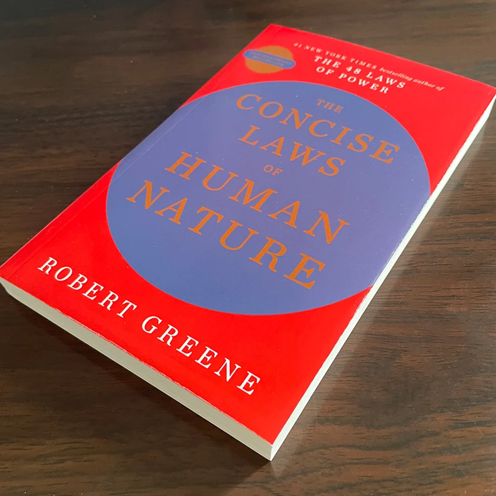 

Teen Adult English Book: The Concise Laws of Human Nature by Robert Greene, Paperback