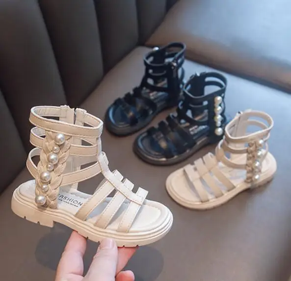 2022 Summer Shoes Girls Sandals Rivets Sandal Boots Cross-tied Kids Shoes Gladiator Sandals Back Zip Roma Princess Shoes Child 
2022 Summer Shoes Girls Sandals Rivets Sandal Boots Cross-tied Kids Shoes Gladiator Sandals Back Zip Roma Princess Shoes Child
