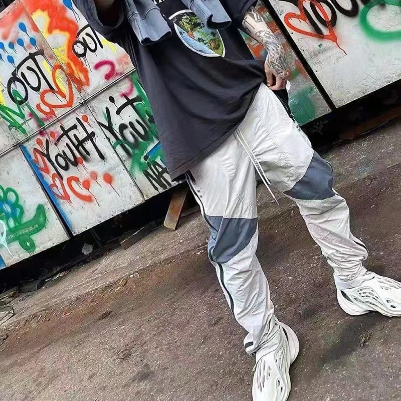 Harajuku Vibe Style Patchwork Waterproof Zipper Casual Trousers Mens Streetwear Drawstring Color Block Oversized Loose Pants
Harajuku Vibe Style Patchwork Waterproof Zipper Casual Trousers Mens Streetwear Drawstring Color Block Oversized Loose Pants