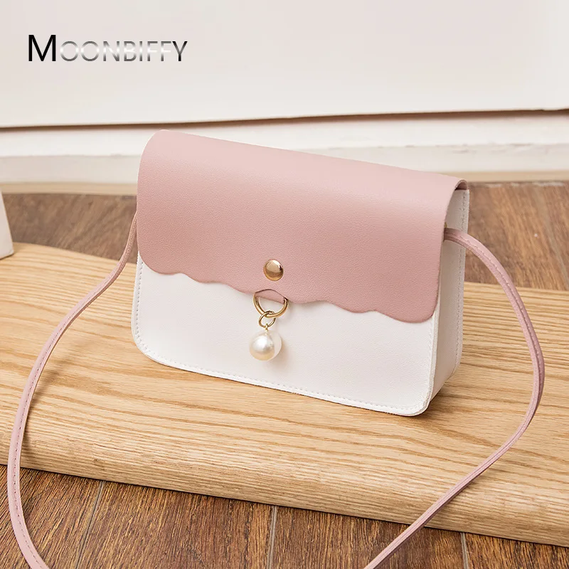 Fashion Simply PU Leather Crossbody Bag For Women Solid Color Shoulder Messenger Bag Lady Pendant Pearl Travel Small Handbag
Fashion Simply PU Leather Crossbody Bag For Women Solid Color Shoulder Messenger Bag Lady Pendant Pearl Travel Small Handbag