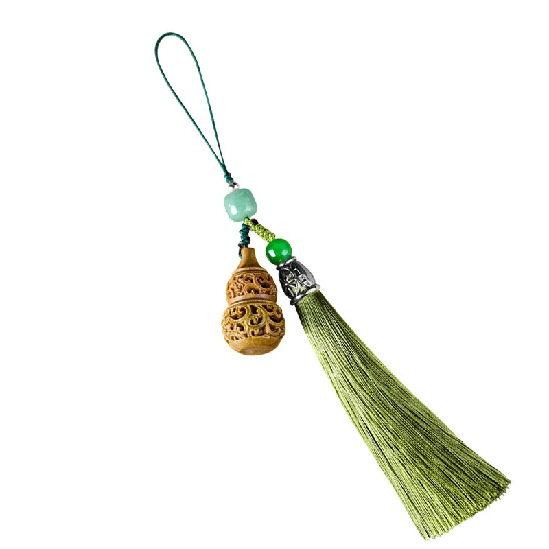 Luminous stone green sandalwood lotus gourd sachet pendant hollow carving DIY mobile phone keychain pendant incense pill 
Luminous stone green sandalwood lotus gourd sachet pendant hollow carving DIY mobile phone keychain pendant incense pill