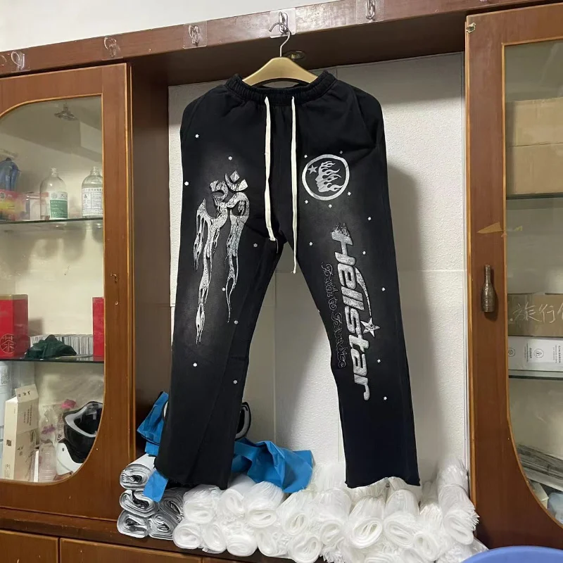 

Hellstar Wash Spliced Sports Sweatpants High Street Flare Black Flame Trousers Casual Bell Bottoms Pnats for Men Women