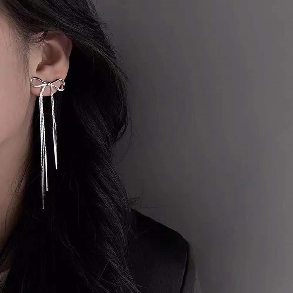 2022 Long Silver Color Bow Tassel Earrings Woman Personality Fashion Simple Unique Design Earrings Wedding Jewelry Birthday Gift
2022 Long Silver Color Bow Tassel Earrings Woman Personality Fashion Simple Unique Design Earrings Wedding Jewelry Birthday Gift
