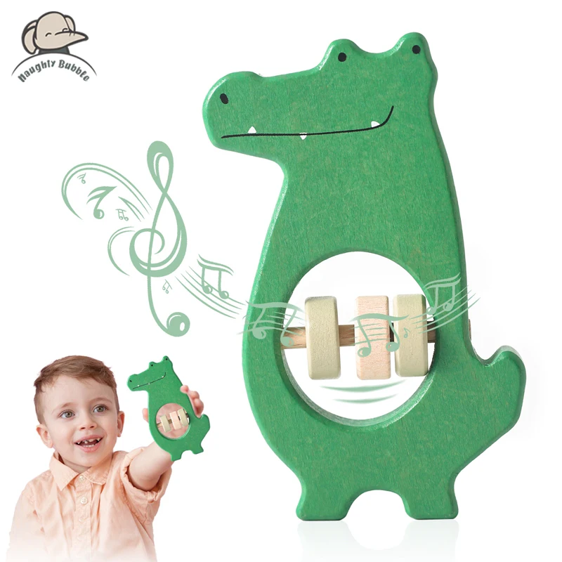 Baby Wooden Rattle Crocodile Handbells Newborn Baby Bed Bell Educational Toys Safe Food Grade Baby Care Teether Baby Items
Baby Wooden Rattle Crocodile Handbells Newborn Baby Bed Bell Educational Toys Safe Food Grade Baby Care Teether Baby Items