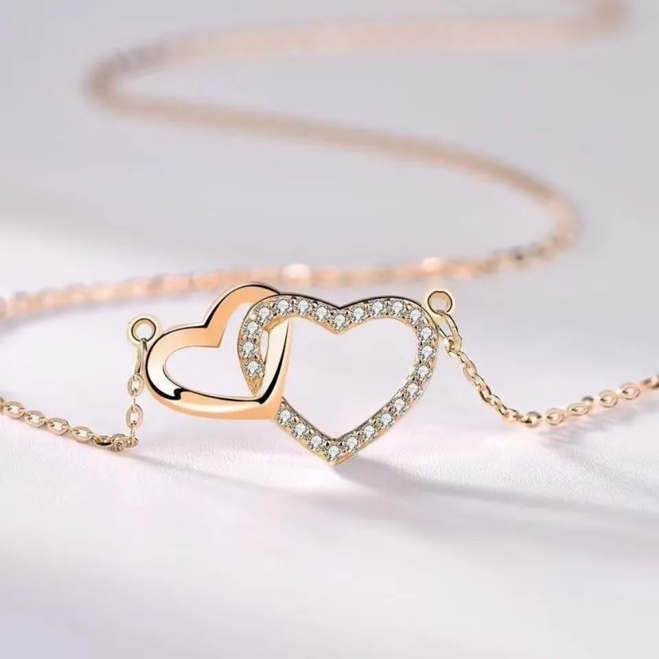 Singapore Heart Necklace women's pure silver color double love clavicle chain student simple accessories
Singapore Heart Necklace women's pure silver color double love clavicle chain student simple accessories