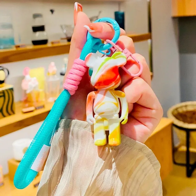 Trendy Colorful Fluid Bear Keychain Pendant Exquisite Couple Creative Bag Car Key Chain Small Gift Wholesale
Trendy Colorful Fluid Bear Keychain Pendant Exquisite Couple Creative Bag Car Key Chain Small Gift Wholesale