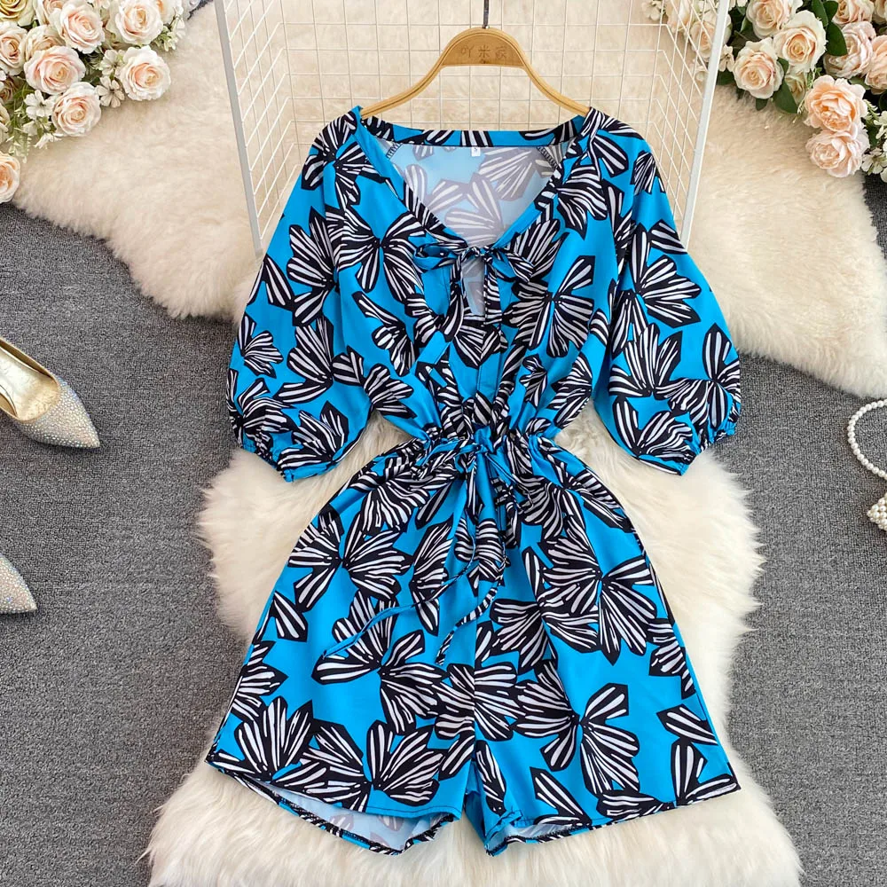 Женский комбинезон с V-образным вырезом и принтом 
Женский комбинезон с V-образным вырезом и принтом