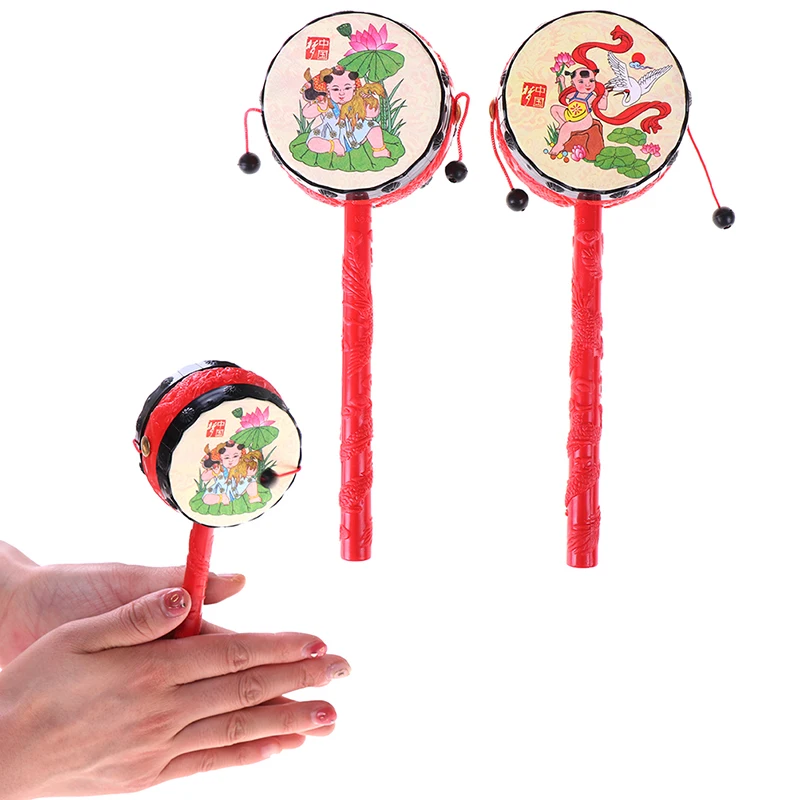 1PCS Baby Kids Cartoon Plastic Chinese Traditional Rattle Drum Spin Fun Toys Hand Bell Music Toys
1PCS Baby Kids Cartoon Plastic Chinese Traditional Rattle Drum Spin Fun Toys Hand Bell Music Toys