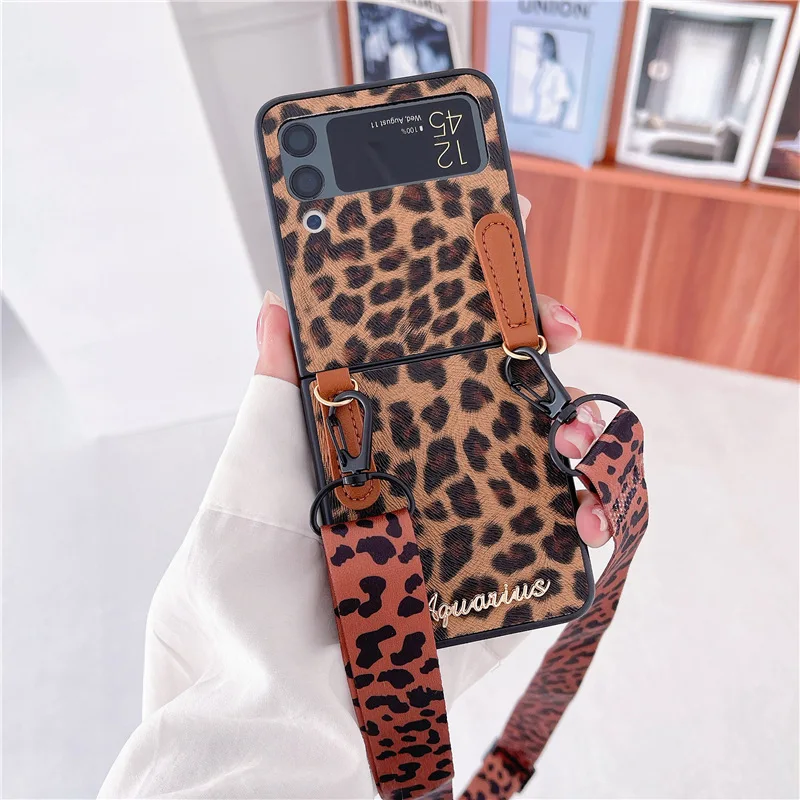 Fashion Leopard Long Strap Phone Case for Samsung Galaxy Z Flip 3 5G Hard PC Back Cover for ZFlip3 Case Protective Shell
Fashion Leopard Long Strap Phone Case for Samsung Galaxy Z Flip 3 5G Hard PC Back Cover for ZFlip3 Case Protective Shell