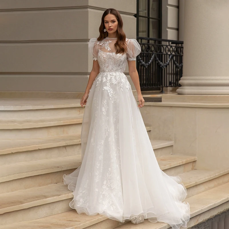 Sexy O-Neck A-line Wedding Dresses Puff Sleeve Flower Open Back Floor Length Appliques Bridal Gown Vestidos De Novia
Sexy O-Neck A-line Wedding Dresses Puff Sleeve Flower Open Back Floor Length Appliques Bridal Gown Vestidos De Novia