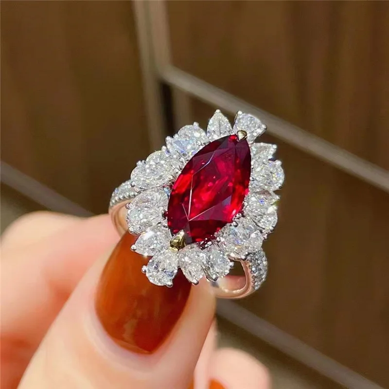 BLACK ANGEL New Silver Luxury Red Tourmaline Marquise Adjustable Women Ring Fashion Inlaid Zircon Wedding Rings Bridal Jewelry
BLACK ANGEL New Silver Luxury Red Tourmaline Marquise Adjustable Women Ring Fashion Inlaid Zircon Wedding Rings Bridal Jewelry