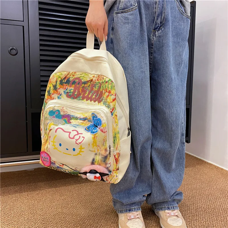 Новый японский вместительный рюкзак Sanrio Kawaii Hello Kitty для девочек, школьный портфель с мультипликационным аниме для учеников средней школы, Портативная сумка
Новый японский вместительный рюкзак Sanrio Kawaii Hello Kitty для девочек, школьный портфель с мультипликационным аниме для учеников средней школы, Портативная сумка