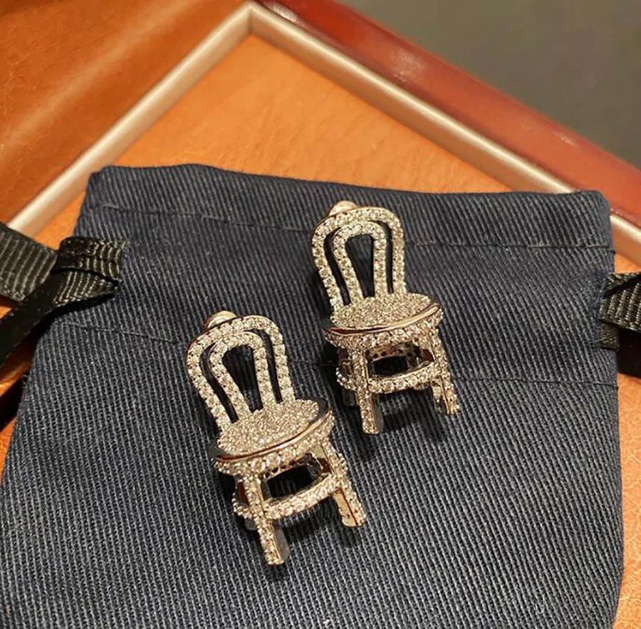 European high end rhinestone chair shape unusual earrings women shiny luxury hollow bench designer charm jewelry classic gift
European high end rhinestone chair shape unusual earrings women shiny luxury hollow bench designer charm jewelry classic gift