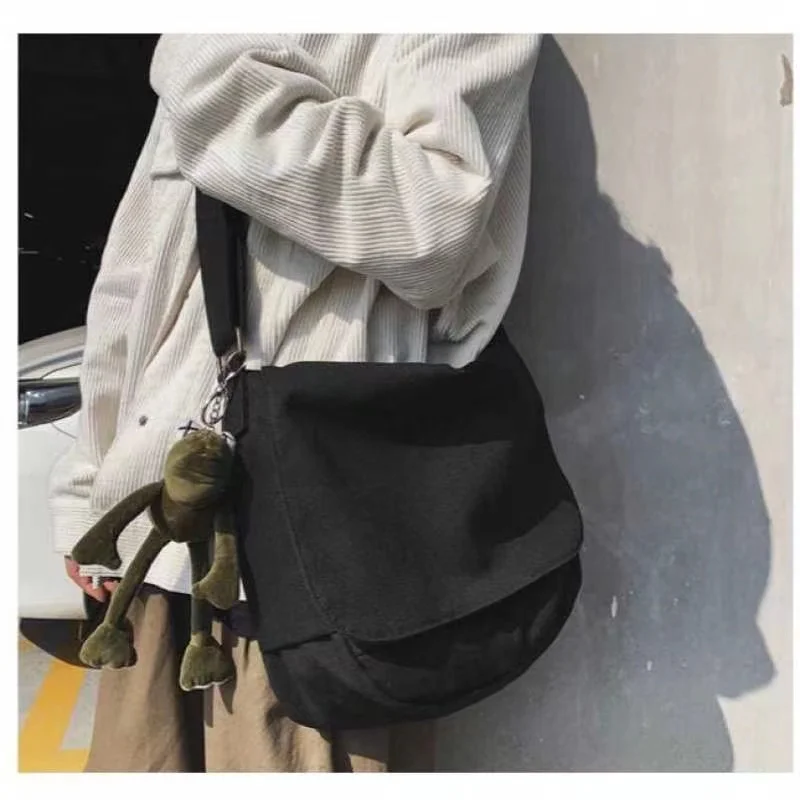 2023 Fashion Canvas Crossbody Youth Bag Shoulder Satchels Women Casual Large Organizer Outdoor Men Messenger Bags with Pendant 
2023 Fashion Canvas Crossbody Youth Bag Shoulder Satchels Women Casual Large Organizer Outdoor Men Messenger Bags with Pendant
