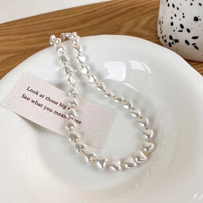 Minar Dainty Heart Shaped Imitation Pearl Choker Necklace for Women Gold Color Beads Chains Necklaces Wedding Daily Jewellery
Minar Dainty Heart Shaped Imitation Pearl Choker Necklace for Women Gold Color Beads Chains Necklaces Wedding Daily Jewellery