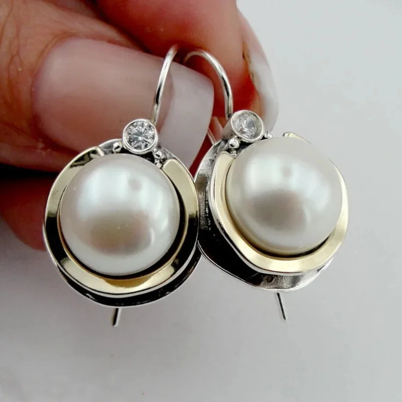 Vintage Round Imitation Pearl Earrings for Women Trendy Silver Color Metal Inlaid White Stone Dangle Earrings Jewelry
Vintage Round Imitation Pearl Earrings for Women Trendy Silver Color Metal Inlaid White Stone Dangle Earrings Jewelry