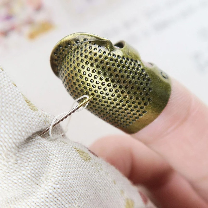 2PCS Finger Protector Vintage Metal Sewing Thimble Household Sewing Accessorie Handworking Stitching Tool Antique Ring DIY Craft 
2PCS Finger Protector Vintage Metal Sewing Thimble Household Sewing Accessorie Handworking Stitching Tool Antique Ring DIY Craft