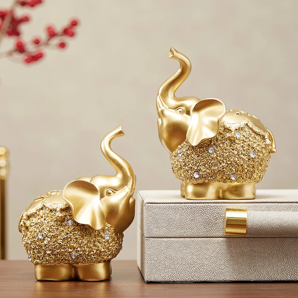 European Elephant Figurines Golden Resin Statue Home Decoration Accessories Living Room Decoration Christmas Decorations
European Elephant Figurines Golden Resin Statue Home Decoration Accessories Living Room Decoration Christmas Decorations