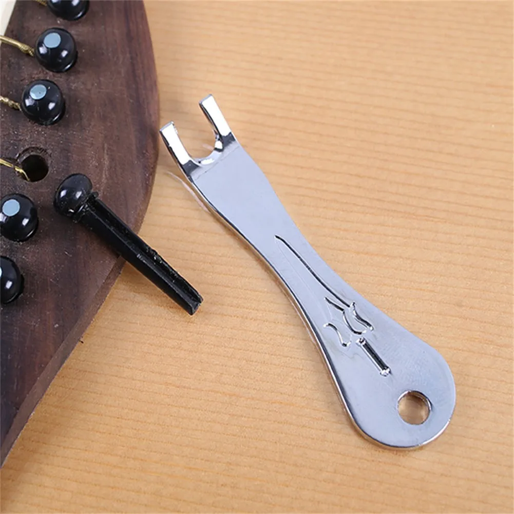 Hot Sale Durable High Quality Brand New Guitar Bridge Pins Puller Acoustic Folk Guitar Metal Pulling Puller Remover
Hot Sale Durable High Quality Brand New Guitar Bridge Pins Puller Acoustic Folk Guitar Metal Pulling Puller Remover