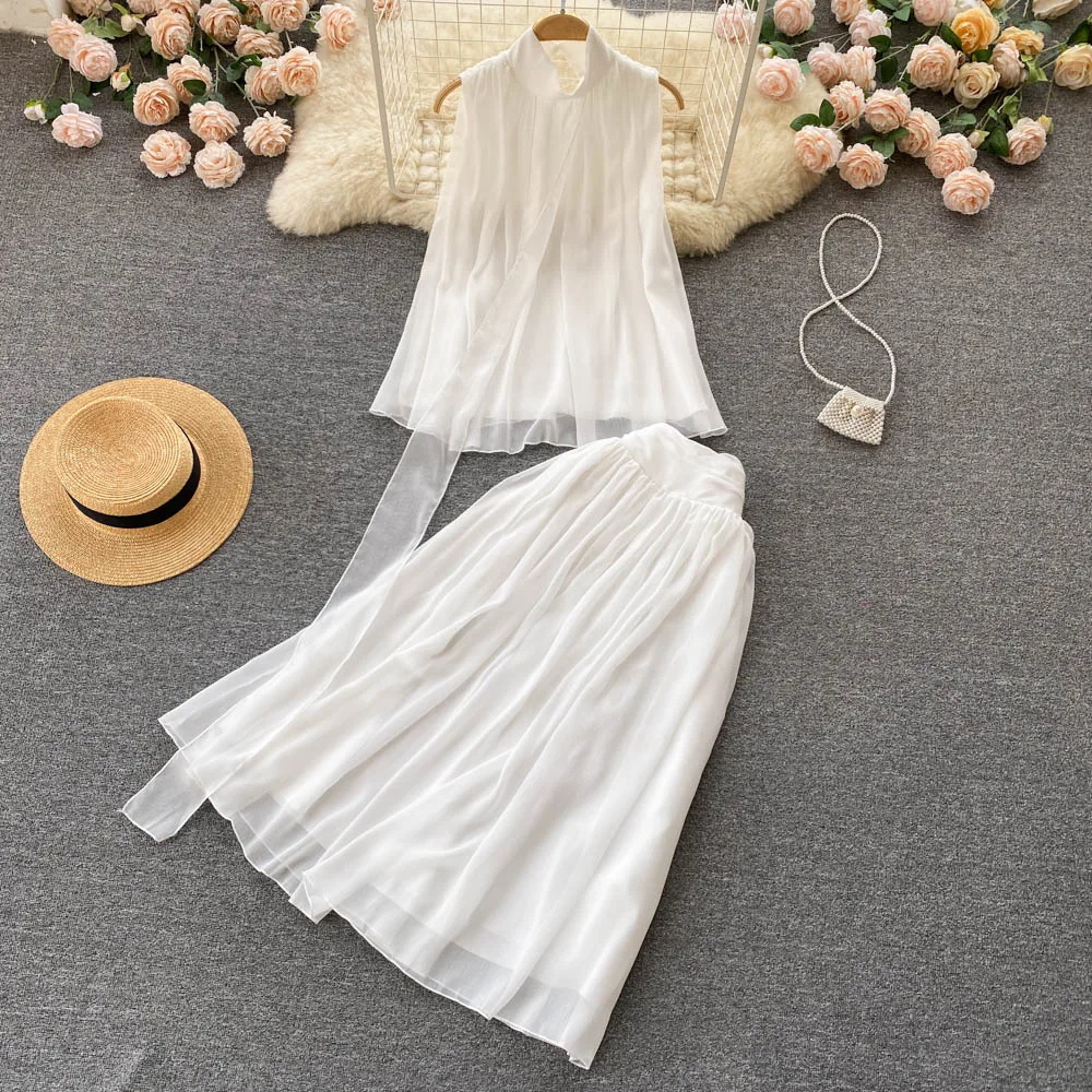 Holiday Style 2022 Summer Forest Fairy Suit Female Fashionable Loose Chiffon Mesh Sleeveless Top + High Waist Skirt 2-piece Set
Holiday Style 2022 Summer Forest Fairy Suit Female Fashionable Loose Chiffon Mesh Sleeveless Top + High Waist Skirt 2-piece Set