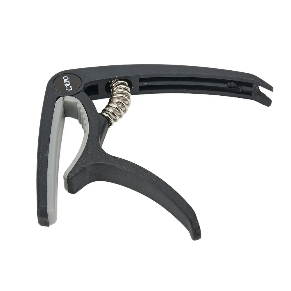 Accessories Guitar Capo Capo Clamps For 6 String Acoustic Electric Guitars Guitar Plastic Tuning Durable High Quality
Accessories Guitar Capo Capo Clamps For 6 String Acoustic Electric Guitars Guitar Plastic Tuning Durable High Quality