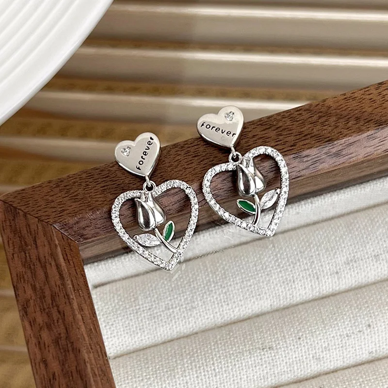 Minar Hot Sale Sparkly Rhinestone Hollow Heart Dangle Earrings for Women Silver Plated Copper Tulip Flower Earring for Women
Minar Hot Sale Sparkly Rhinestone Hollow Heart Dangle Earrings for Women Silver Plated Copper Tulip Flower Earring for Women