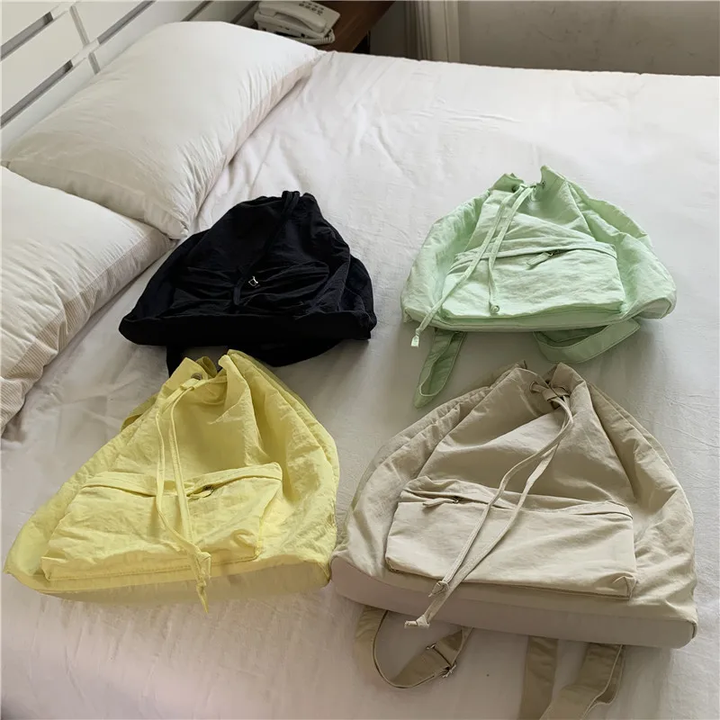 Nylon Backpack Leisure Versatile Shopping Bag Student Canvas Bag Large Capacity Student String Bag Drawstring School Bag
Nylon Backpack Leisure Versatile Shopping Bag Student Canvas Bag Large Capacity Student String Bag Drawstring School Bag