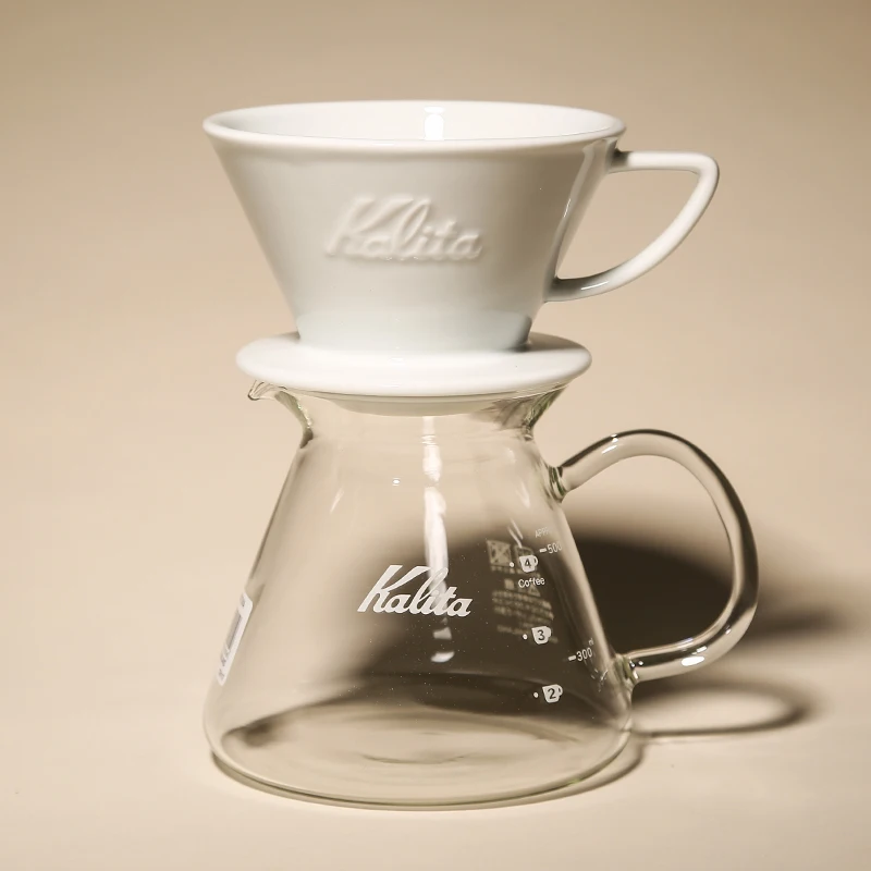 Японский ручной перфоратор kalita, набор кофейников, бытовой капельный фильтр, чашка для совместного использования стекла, кружка с фильтром, кофейный инструмент
Японский ручной перфоратор kalita, набор кофейников, бытовой капельный фильтр, чашка для совместного использования стекла, кружка с фильтром, кофейный инструмент