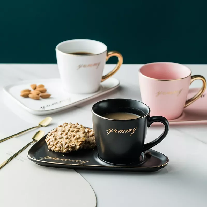 Rim ceramic Coffee mug tumbler Tea Cup and Saucer Set porcelain gold spoon mugs cute dessert cups bone china tea sets
Rim ceramic Coffee mug tumbler Tea Cup and Saucer Set porcelain gold spoon mugs cute dessert cups bone china tea sets