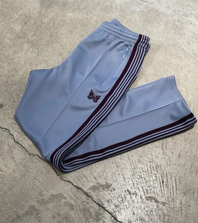Men Women 1:1 Best Quality Webbing Striped Embroidery Butterfly Needles Track Pants AWGE Trousers 2022ss Needles Pants
Men Women 1:1 Best Quality Webbing Striped Embroidery Butterfly Needles Track Pants AWGE Trousers 2022ss Needles Pants