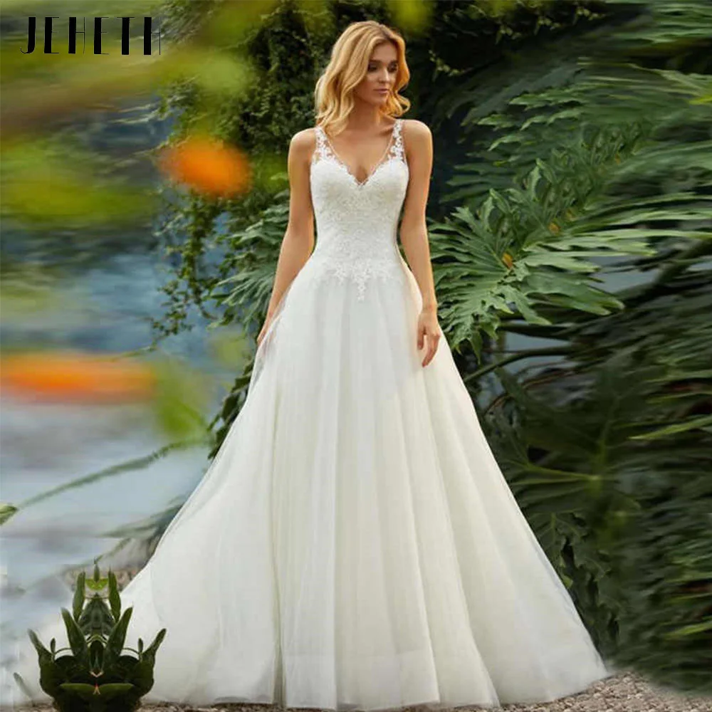 Vintage Wedding Dresses Backless V-Neck Appliqued A-Line Tulle Bride Robe Mariee Open Back Vestido De Novia Bridal Gowns
Vintage Wedding Dresses Backless V-Neck Appliqued A-Line Tulle Bride Robe Mariee Open Back Vestido De Novia Bridal Gowns
