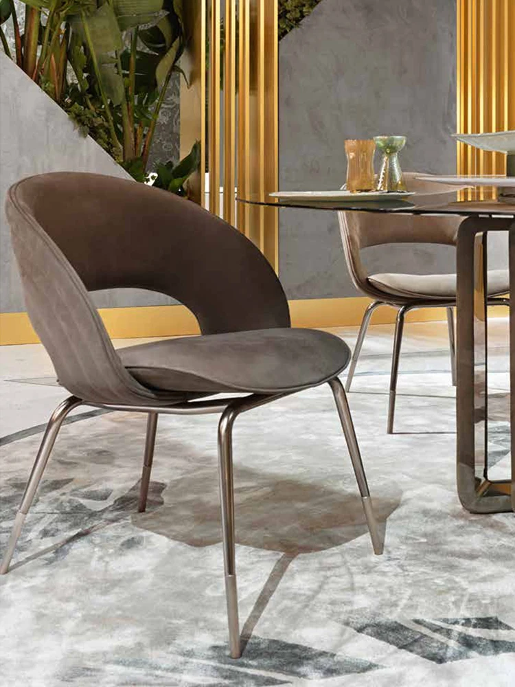 Italian style light luxury imported furniture custom-made high-end luxury golden fabric design sense dining chair
Italian style light luxury imported furniture custom-made high-end luxury golden fabric design sense dining chair