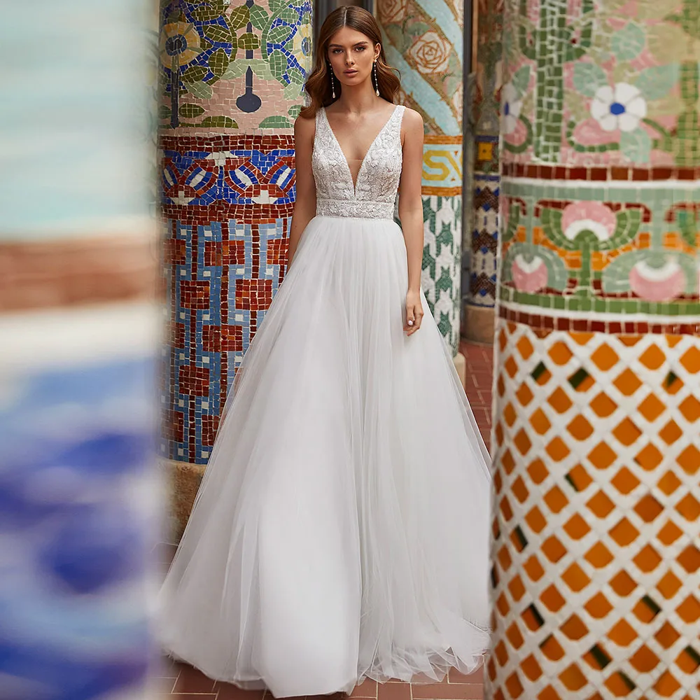 Boho Ivory A-Line Wedding Dresses for Bride 2023 V Neck Sweep Train Spaghetti Strap Bridal Gowns Tulle Open Back Vestido De no
Boho Ivory A-Line Wedding Dresses for Bride 2023 V Neck Sweep Train Spaghetti Strap Bridal Gowns Tulle Open Back Vestido De no