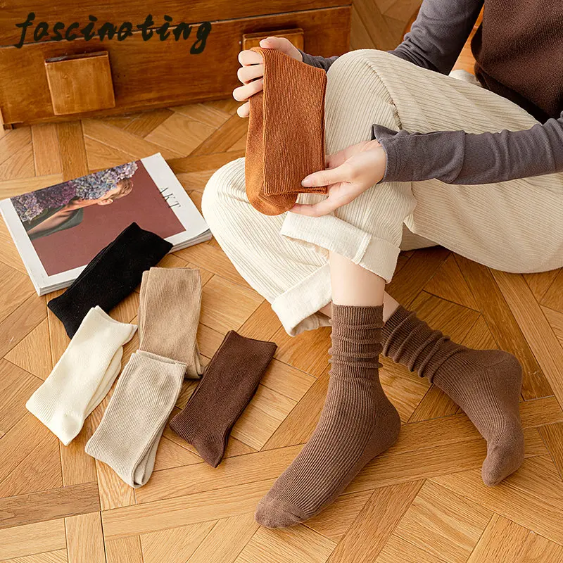 Autumn and winter socks women's solid color simple mid-tube socks pure cotton literary autumn everything pile pile socks
Autumn and winter socks women's solid color simple mid-tube socks pure cotton literary autumn everything pile pile socks