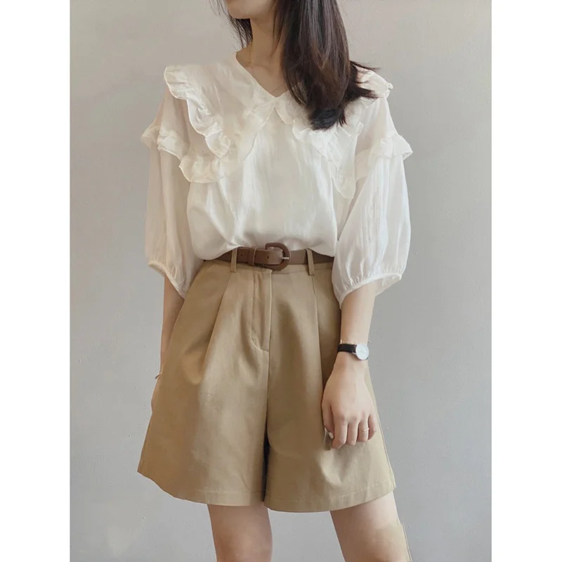 The new set is matched with women's wear, wooden ear edge bubble sleeve shirt, thin five wide leg casual two-piece set (summer)
The new set is matched with women's wear, wooden ear edge bubble sleeve shirt, thin five wide leg casual two-piece set (summer)
