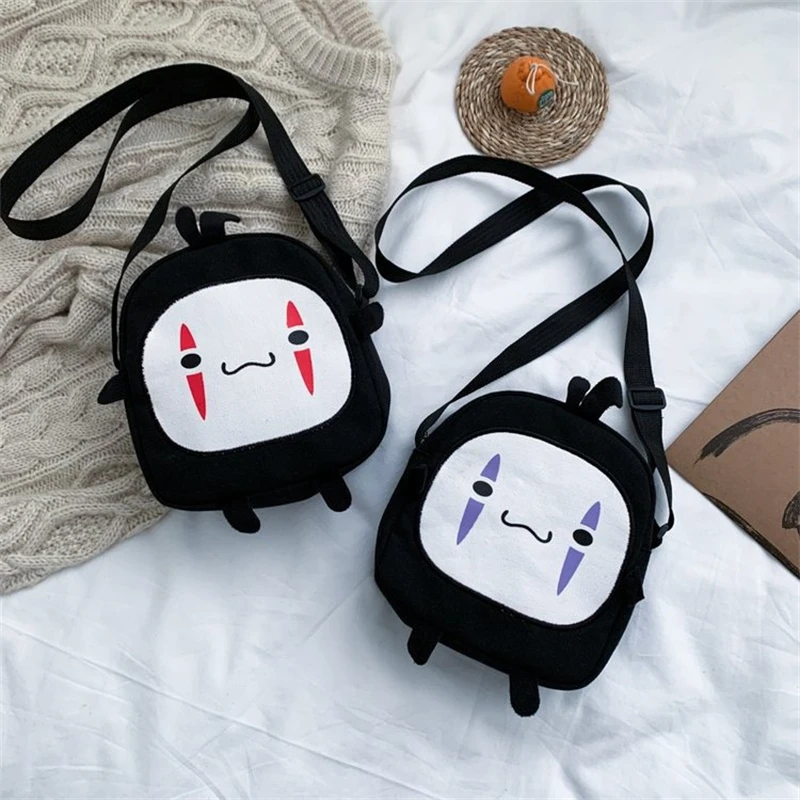 Spirited Away Faceless Man Printed Logo Cute Version Small Round Shoulder Bag Monster Cartoon Canvas Messenger Bag 
Spirited Away Faceless Man Printed Logo Cute Version Small Round Shoulder Bag Monster Cartoon Canvas Messenger Bag