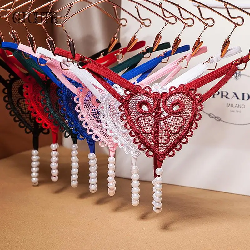 New Embroidery Flower Massage Beads G-String Women T Panties Beautiful Sexy Mini Buttocks Low Rise Thong Briefs Lingeries
New Embroidery Flower Massage Beads G-String Women T Panties Beautiful Sexy Mini Buttocks Low Rise Thong Briefs Lingeries