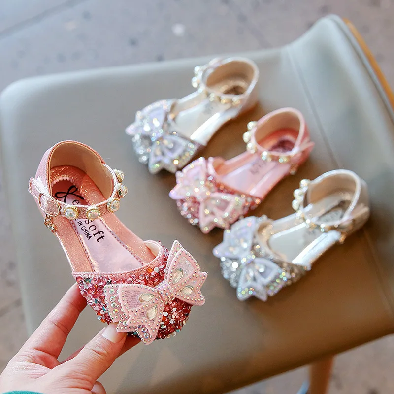 Туфли детские кожаные со стразами и бантом, обувь принцессы для девочек, для свадьбы, вечеринки, танцев, обувь на плоской подошве для школьников, представлений
Туфли детские кожаные со стразами и бантом, обувь принцессы для девочек, для свадьбы, вечеринки, танцев, обувь на плоской подошве для школьников, представлений